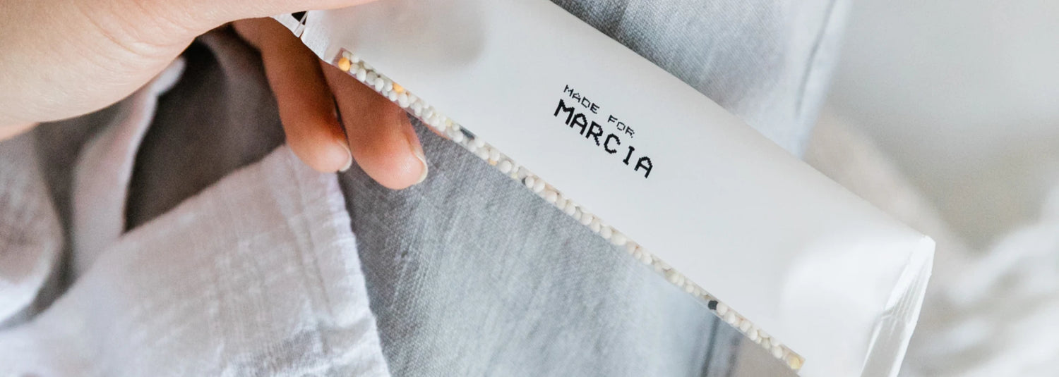 Person holding Rootine's Smart Multivitamin Packet