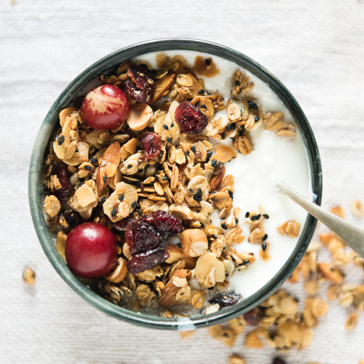 Yogurt breakfast bowl with Rootine's Smart Multivitamin mixed in